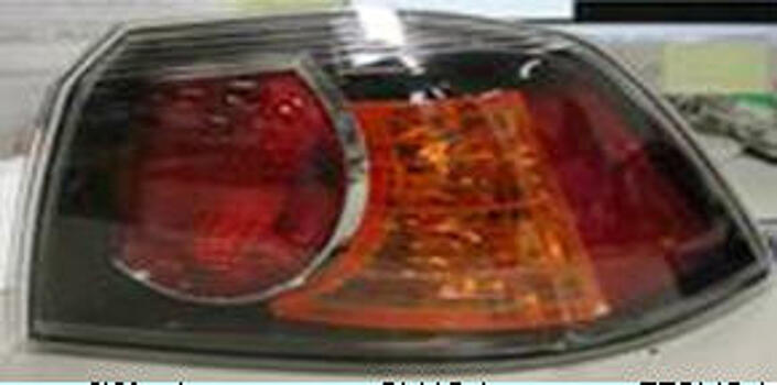 Фонарь задний внешний правый (для кузова седан) (черный хаузинг) MITSUBISHI LANCER 07- MBLAN07-741B-R 