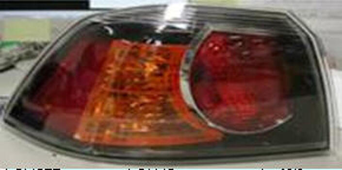 Фонарь задний внешний левый (для кузова седан) (черный хаузинг) MITSUBISHI LANCER 07- MBLAN07-741B-L 