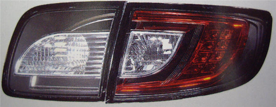 Фонари задние (4шт) тюнинг (для кузова седан) прозрач, с диодами красный хаузинг, цвет черный MAZDA 3 04- MZX0304-761-N 