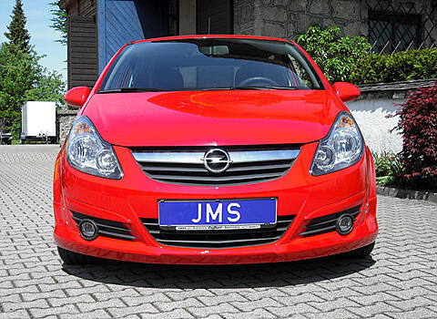 Губа в передний бампер Opel Corsa D JMS Tuning 00243938 